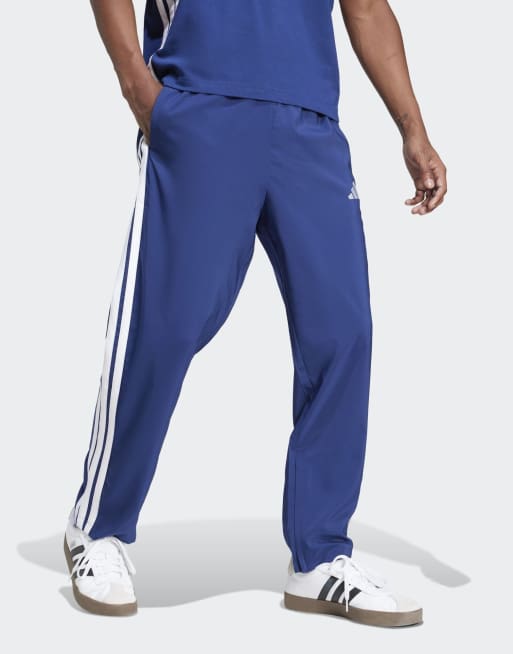 adidas Performance Essentials – Granatowo-białe spodnie z luźnym dołem i 3 paskami, 3 z 4