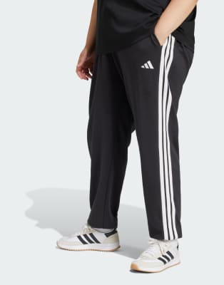 adidas performance - Essentials - Hose aus French Terry in Schwarz / Weiß mit den 3 Streifen und Bündchen