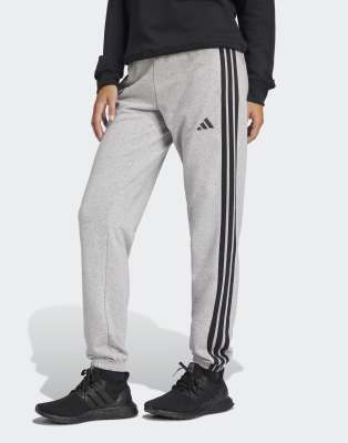 Essentials - Pantalon en tissu ponge  3 bandes resserr aux chevilles - chin moyen/noir - Adidas Performance - Modalova