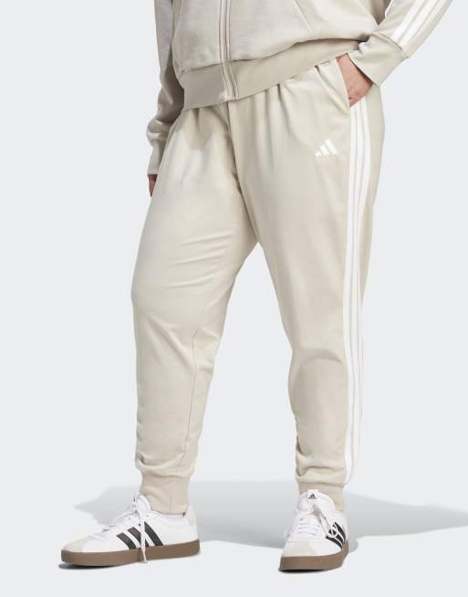 adidas performance - Essentials - Pantaloni joggers (taglia comoda) beige/bianco con 3 strisce