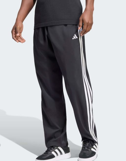 adidas Performance - Essentials - Pantaloni leggeri Stanford affusolati neri con 3 strisce bianche e orlo aperto, 2 di 4