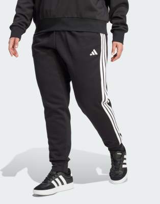 adidas Performance - Essentials - Plus-Size-Hose aus Fleece in Schwarz/Weiß mit den drei Streifen