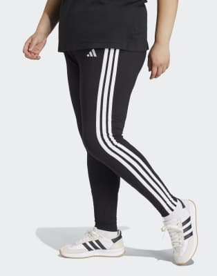 adidas performance - Essentials - Plus-Size-Leggings aus Baumwolle in Schwarz / Weiß mit den drei Streifen