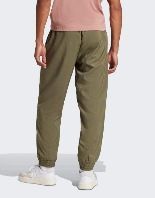 adidas performance Essentials small logo stanford pants in olive strata / black, 2 of 4