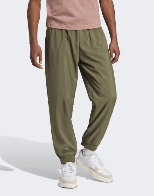 adidas performance Essentials small logo stanford pants in olive strata / black, 3 of 4