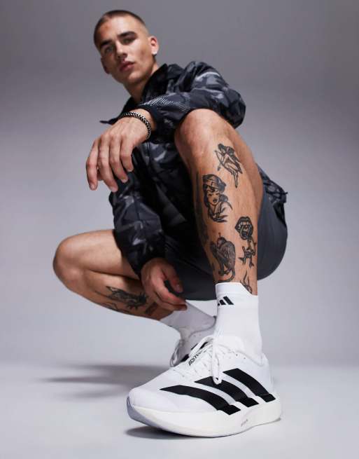 adidas Performance Evo sneakers in white and black
