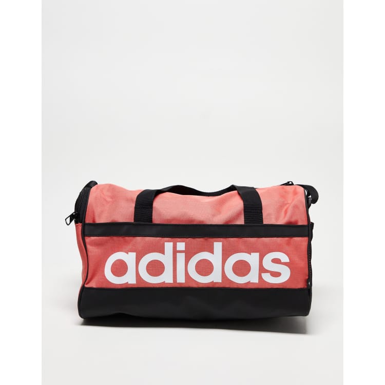 adidas Performance extra small duffel bag in coral ASOS