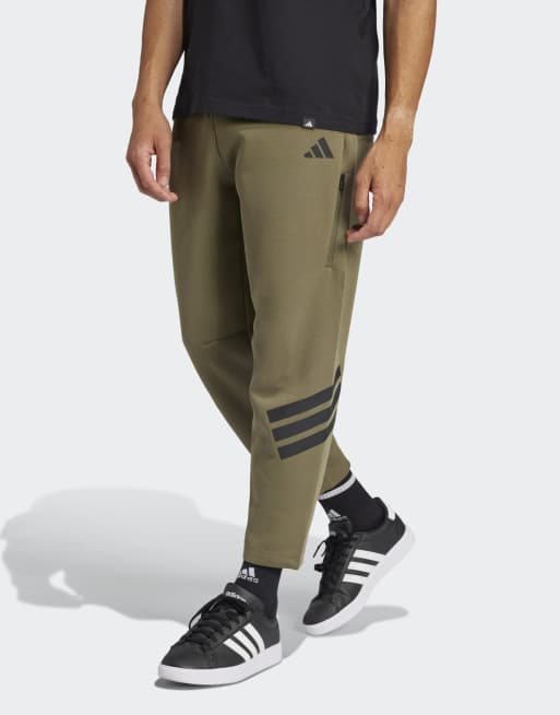 adidas performance - Future Icons - Pantaloni oliva strata con tasche e 3 strisce