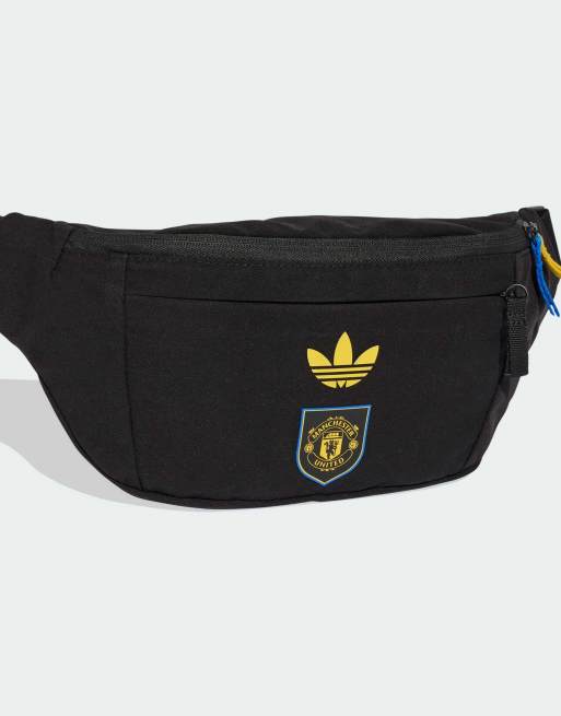 adidas performance Manchester United third waist bag in black / tribe yellow / glow blue