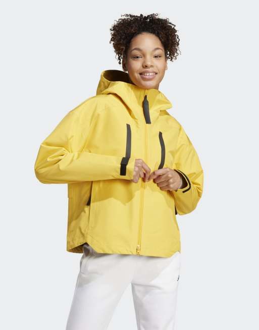 adidas Performance – Myshelter – Guldfärgad regnjacka