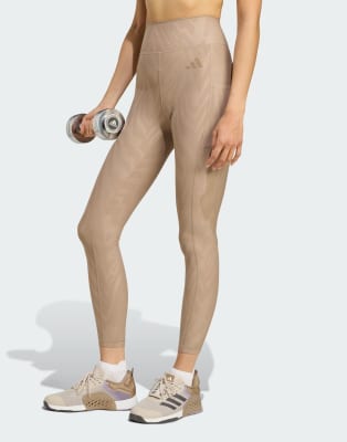 adidas Performance - Optimé - Gemusterte Leggings in voller Länge in Kreidebraun-Brown