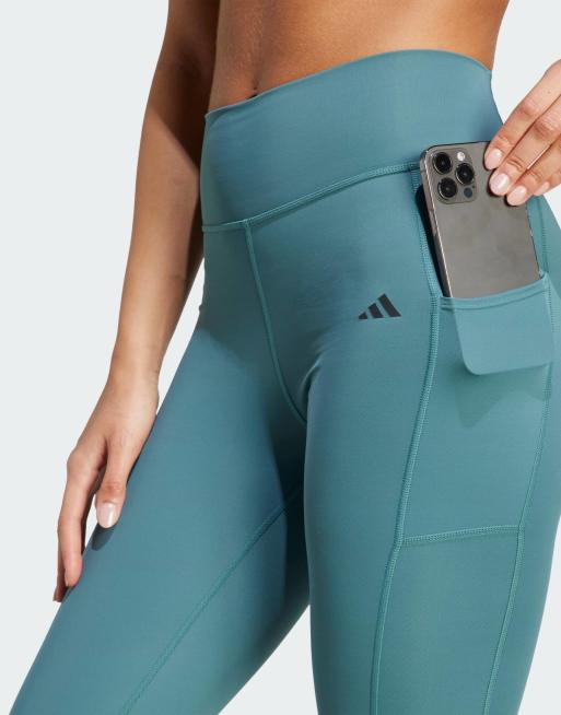 adidas performance Optime stash 7/8 leggings in preloved teal ASOS