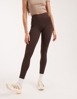 adidas Performance - Optime Workout - Lange Sportleggings in Aurora Coffee-Brown