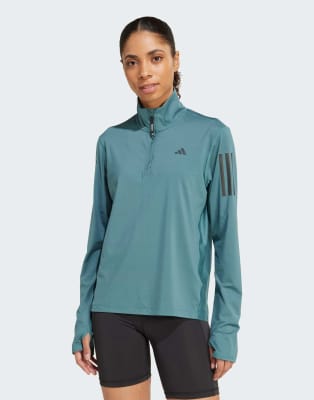 adidas Performance - Own the Run - Jacke in Preloved Teal mit kurzem Reißverschluss-Blau