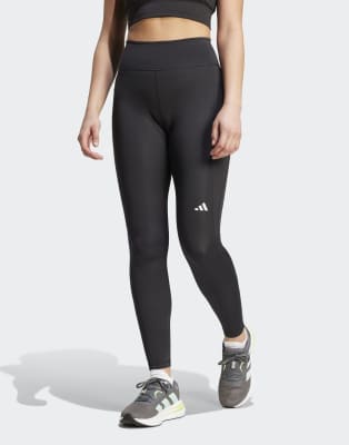 adidas Performance - Own the run Winter - Lange Leggings in Schwarz