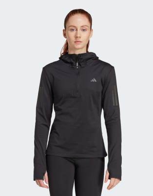 adidas Performance - Own the run Winterized - Jacke in Schwarz mit kurzem Reißverschluss