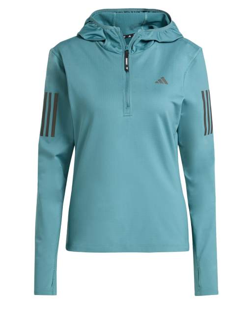 adidas performance – Own The Run Winterized – Turkusowa kurtka z kapturem z zamkiem pod szyją