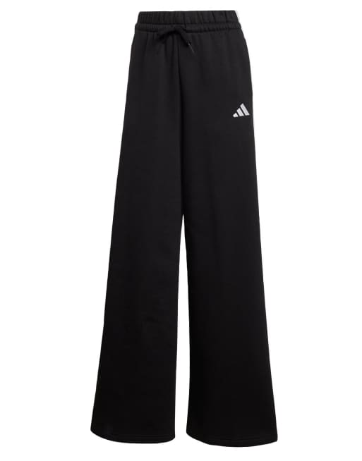adidas performance - Pantaloni ampi neri in pile con 3 strisce, 5 di 5