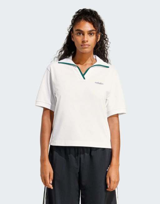 adidas performance Seasonal Essentials Colorpop polo with embroidered graphic in white / collegiate green