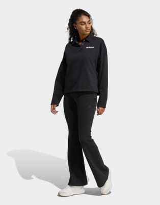 adidas Performance - Seasonal Essentials - Schlaghose aus French Terry in Schwarz