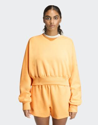 adidas performance - Soft Lux - Loose-Fit-Sweatshirt in Semi Ice Tangerine-Orange