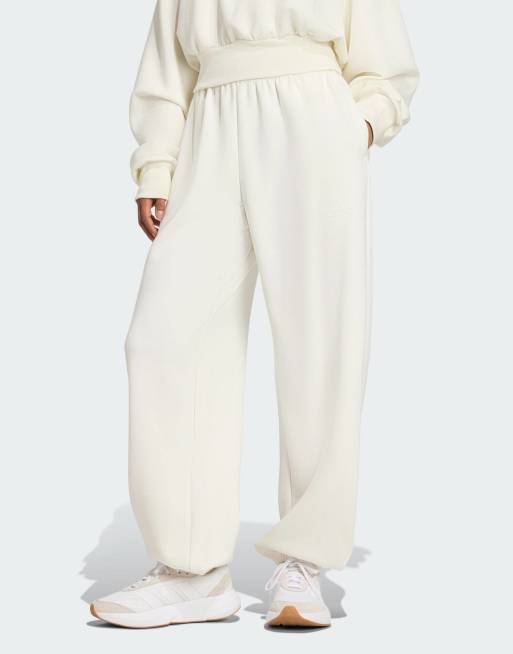 adidas Performance – Soft Lux – Naturvita byxor med ledig passform