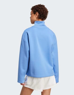 adidas Performance - Soft Lux - Oberteil in Blue Fusion mit kurzem Reißverschluss-Blau