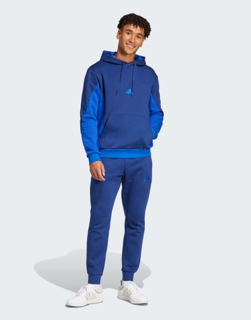 adidas Performance - Sportswear - Survêtement en polaire à capuche et effet color block - Bleu foncé
