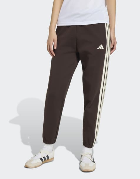 adidas Performance – Stadium – Kaffebruna byxor i regular fit med tre ränder - view 1