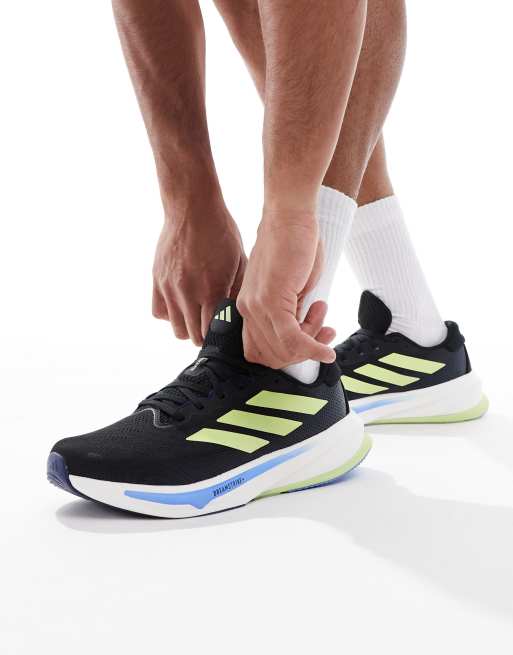 adidas performance Supernova rise 2 running shoes in core black / pulse lime / blue