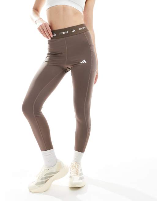 adidas Performance - Techfit - Lange legging met steekzak in bruin