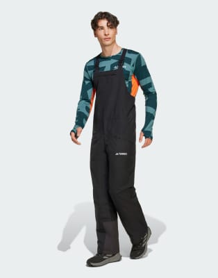 adidas performance Terrex multi 2 layer insulated climaproof bib pants in black / black