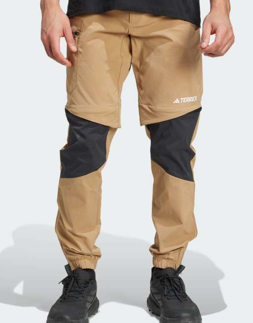 adidas Performance - Terrex Utilitas - Pantaloni da hiking color cartone con zip