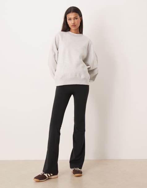 adidas Performance - Three Stripes Studios - Pantaloni a zampa neri con fascia in vita incrociata - view 1