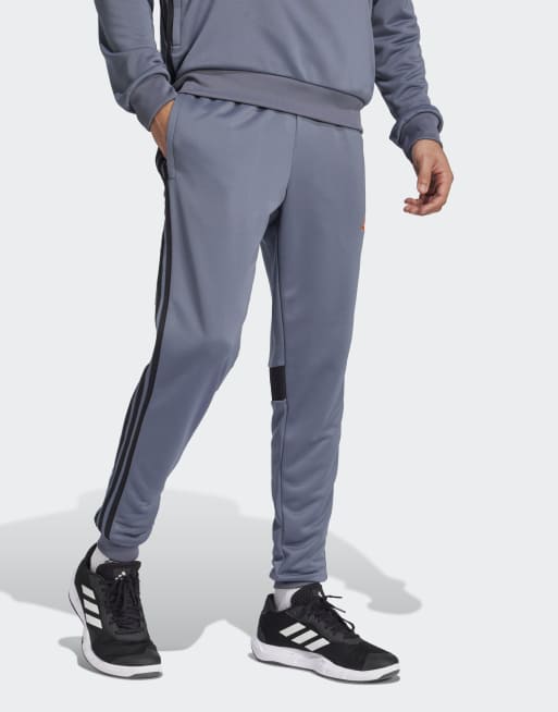 adidas Performance - Tiro 25 Essentials - Pantaloni felpati color onice team / arancione super