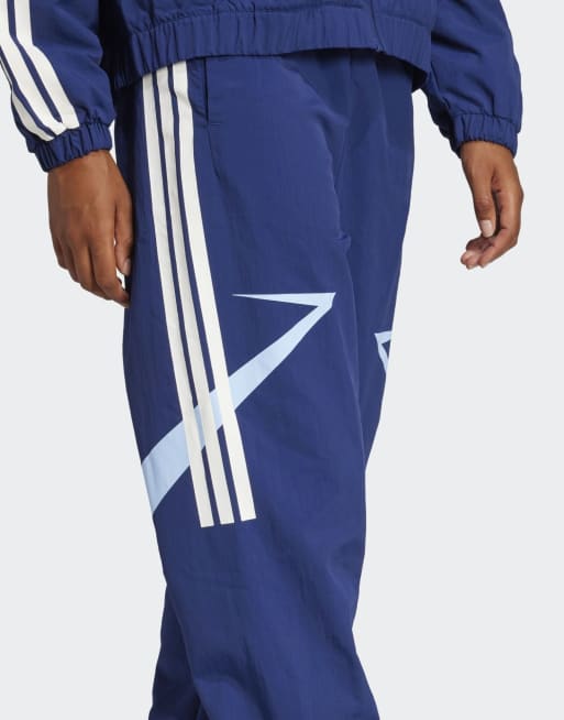 adidas performance Tiro cut 3-stripes color block cuffed pants in dark blue / glow blue, 4 of 4
