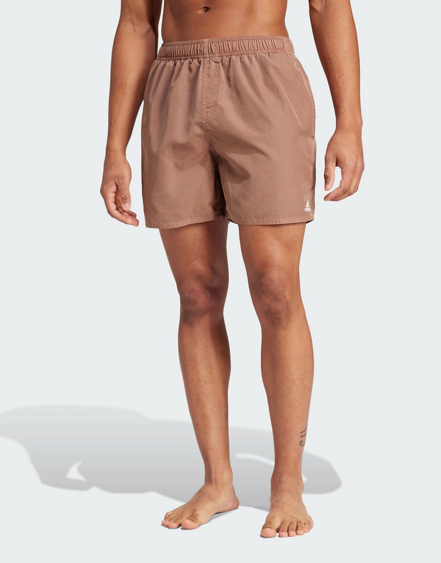 adidas Performance washed out Cix swim shorts in brown-Neutral