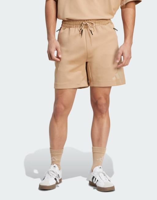 adidas performance Z.n.e. shorts in warm sandstone