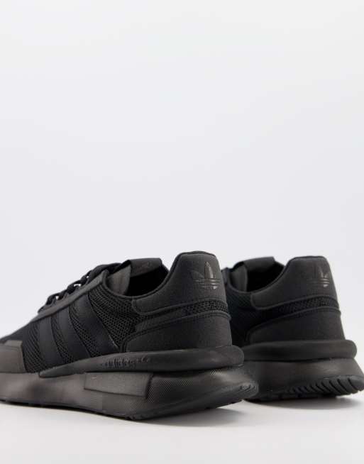 adidas Retroset sneakers in black | ASOS