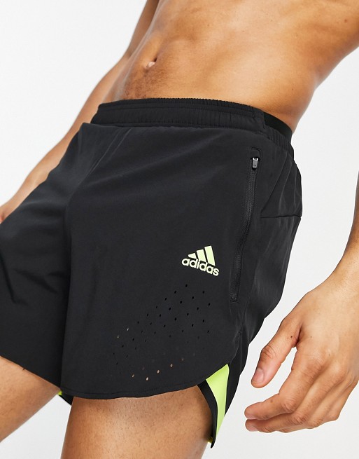 adidas Running 2 in 1 shorts in black and yellow
