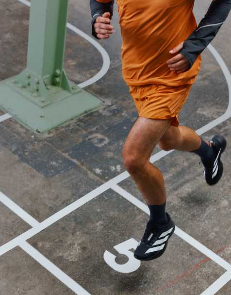 adidas Running – Adi365 – Shorts in Dusky Orange mit den 3 Streifen - view 1