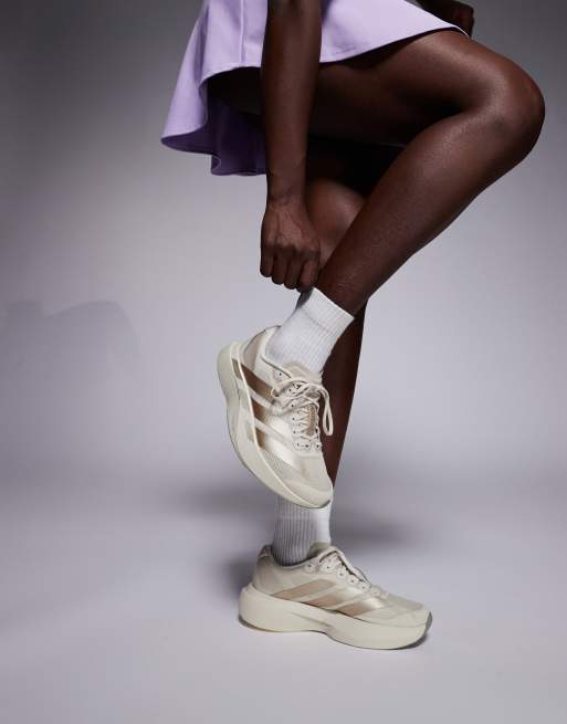 adidas Running Adizero Evo SL sneakers in off-white and gold | ASOS