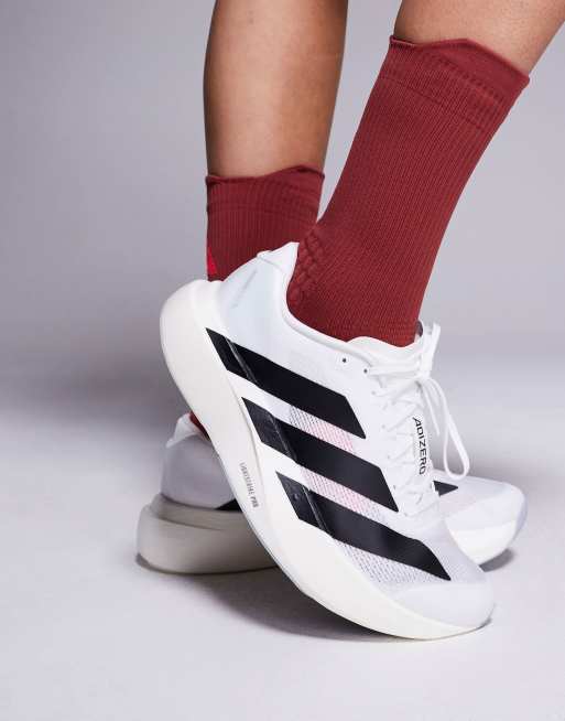 adidas Running Adizero Evo SL sneakers in white and black | ASOS