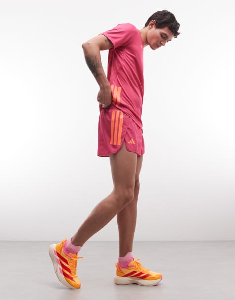 adidas Running Adizero split shorts in pink and orange