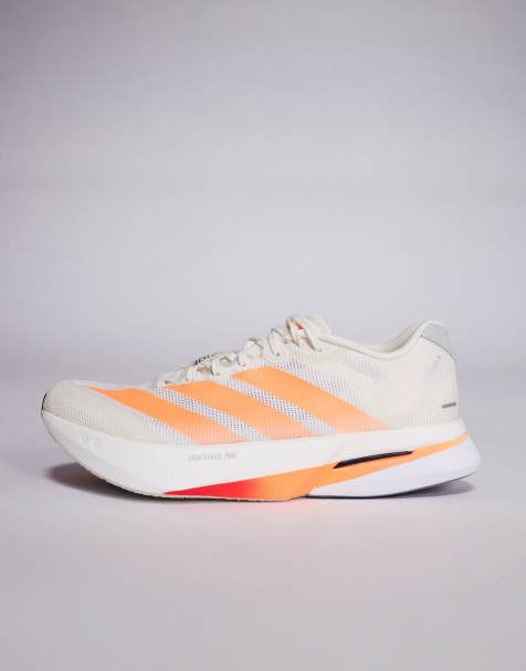 adidas Running Boston 13 trainers in orange and white - view 1