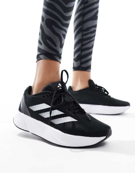 Black and white running hotsell shoes womens