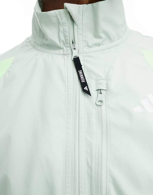 adidas Running Own The Run jacket in pastel green ASOS