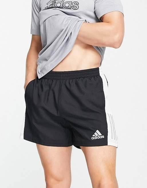 adidas Running – Own the Run – Laufshorts in Schwarz mit weißen Bahnen 