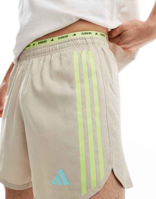 adidas Running – Own The Run – Shorts in Beige mit den 3 Streifen, 4 von 5