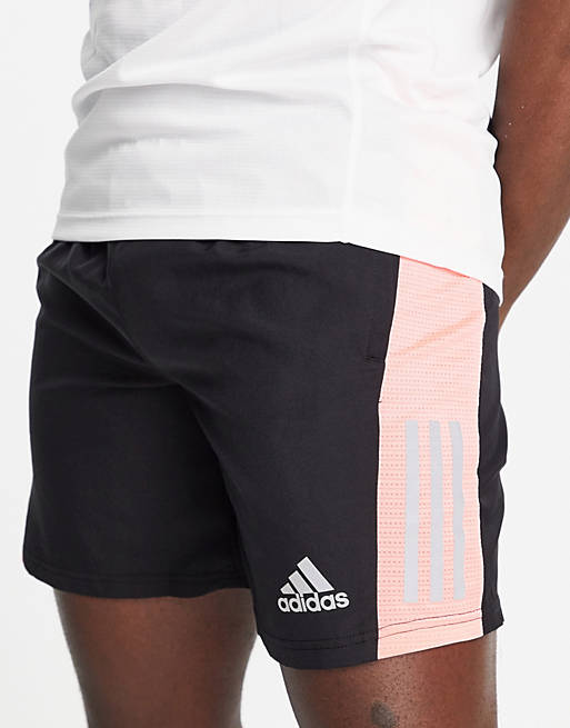 adidas Running Own The Run shorts in black and pink